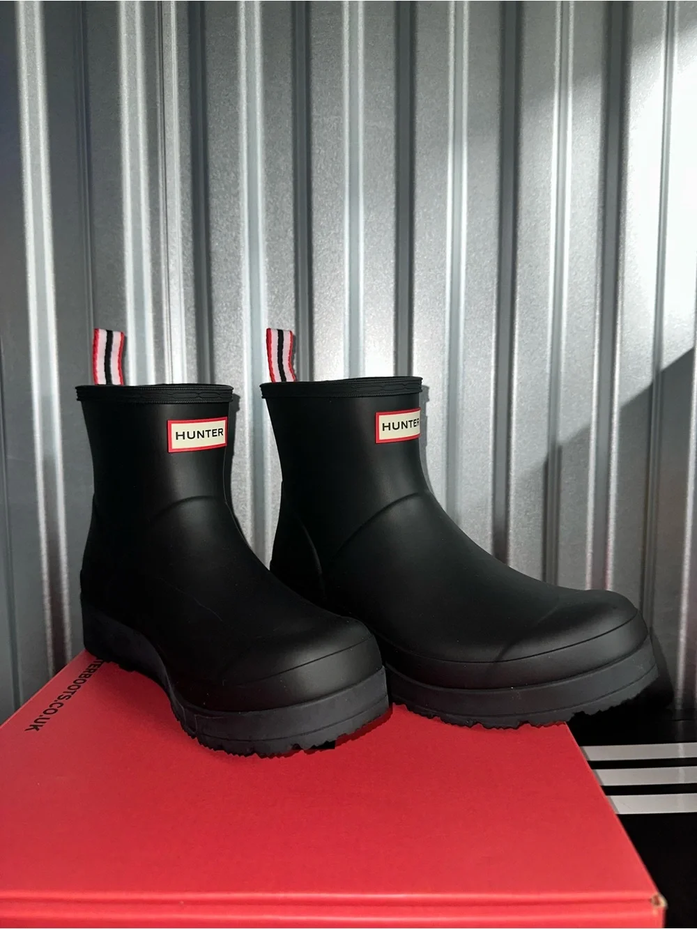 Hunter Black Short Rain Boots with Red-Trim Pull Tabs
